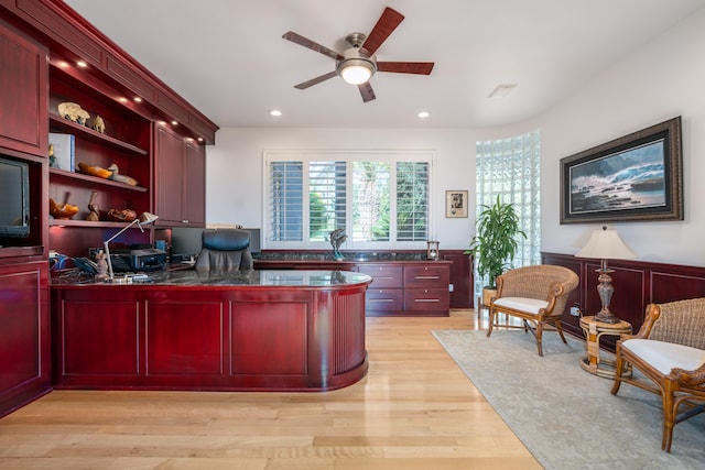 office area with light hardwood / wood-style flooring and ceiling fan