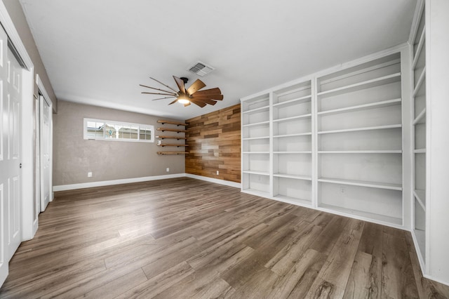 2648 Tremonto Rd, Anderson, CA 96007 - unfurnished room featuring baseboards, wood finished floors, visible vents, and ceiling fan