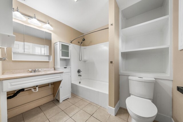 2648 Tremonto Rd, Anderson, CA 96007 - bathroom featuring tile patterned flooring, toilet, vanity, and bathtub / shower combination