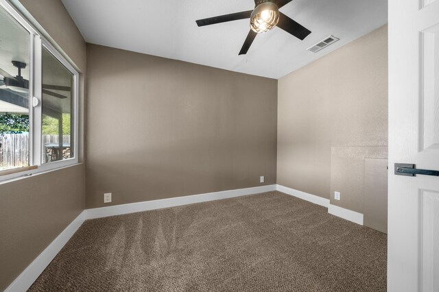 2648 Tremonto Rd, Anderson, CA 96007 - carpeted empty room with a ceiling fan, visible vents, and baseboards