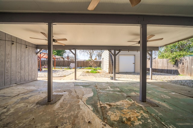2648 Tremonto Rd, Anderson, CA 96007 - view of patio featuring a ceiling fan, an outbuilding, and a fenced backyard