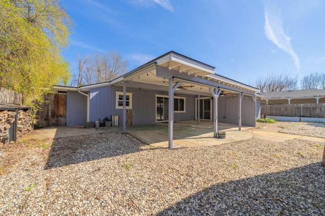 2648 Tremonto Rd, Anderson, CA 96007 - rear view of property featuring a patio area, a carport, ceiling fan, and fence