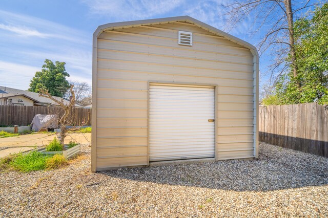2648 Tremonto Rd, Anderson, CA 96007 - garage featuring fence and a shed