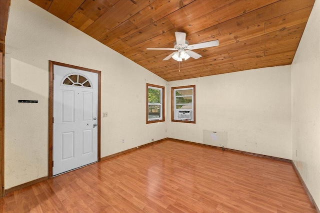 empty room with lofted ceiling, ceiling fan, wooden ceiling, light hardwood / wood-style flooring, and cooling unit