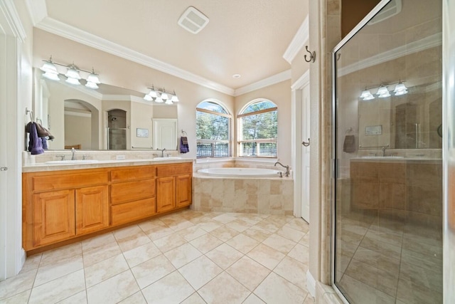 bathroom featuring vanity, plus walk in shower, crown molding, and tile patterned floors