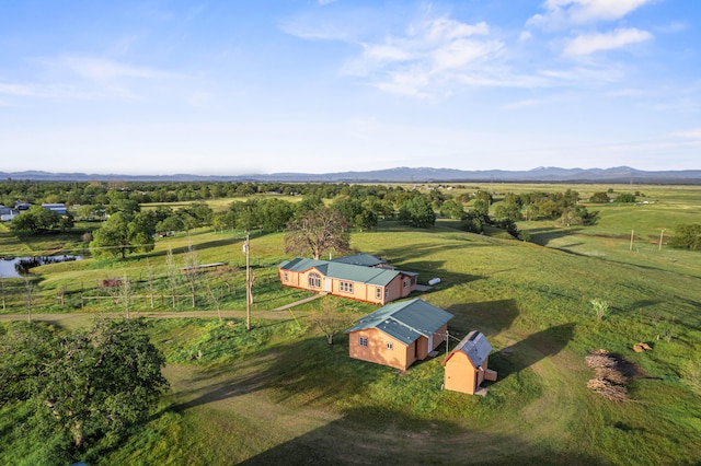 bird's eye view with a mountain view and a rural view