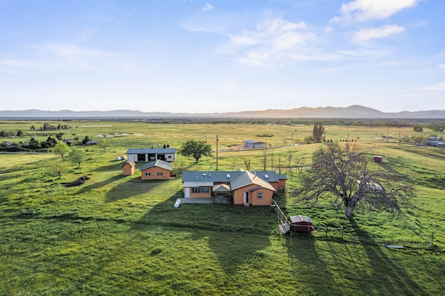 bird's eye view with a mountain view and a rural view