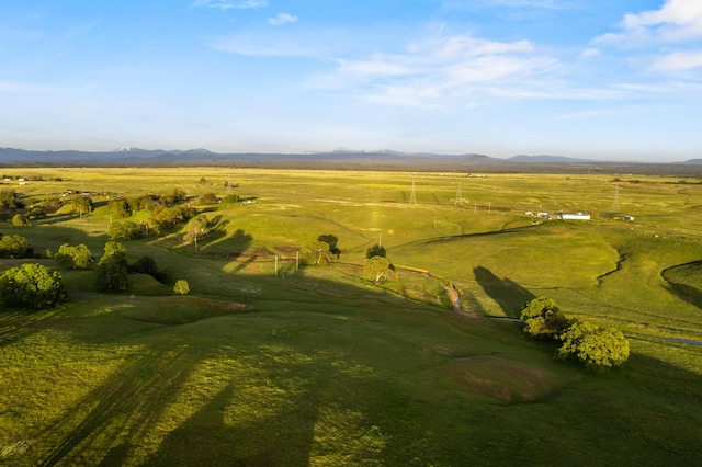 bird's eye view with a mountain view and a rural view