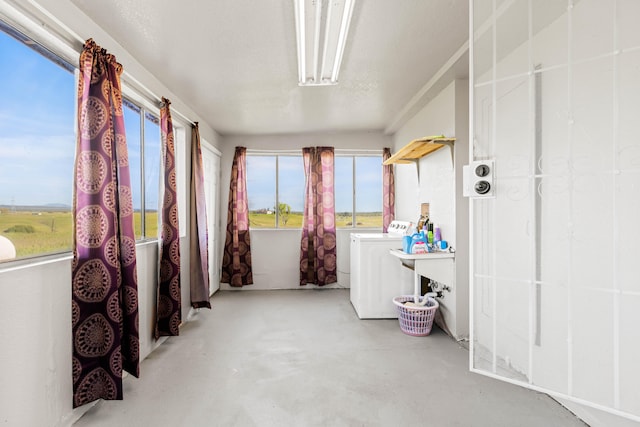 sunroom / solarium with washer / clothes dryer