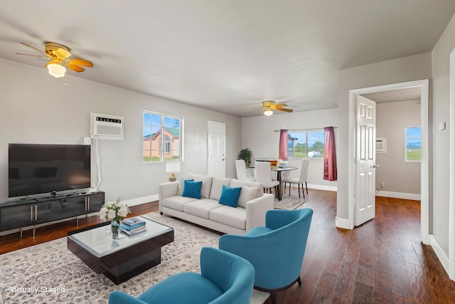 living room featuring an AC wall unit, ceiling fan, and dark hardwood / wood-style flooring