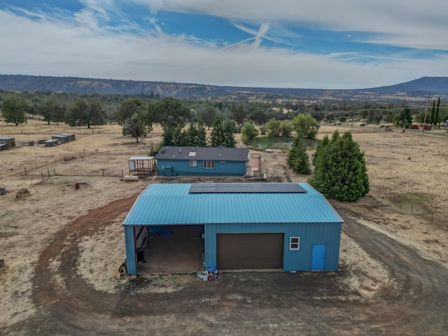 bird's eye view with a rural view and a mountain view