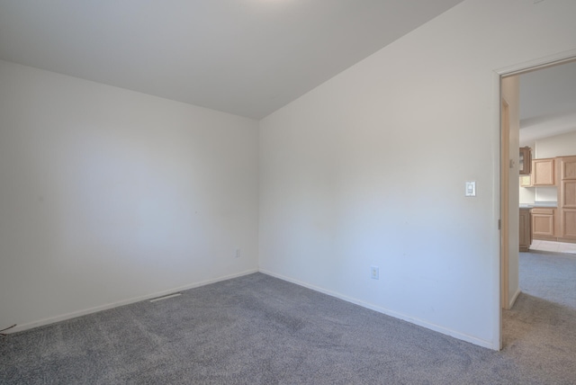 spare room with carpet flooring