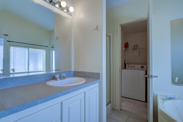 bathroom with vanity, washer / clothes dryer, separate shower and tub, and tile patterned flooring