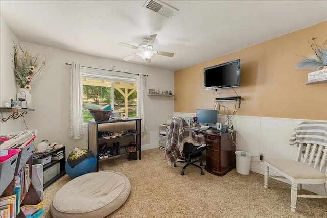 office area featuring a textured ceiling and ceiling fan