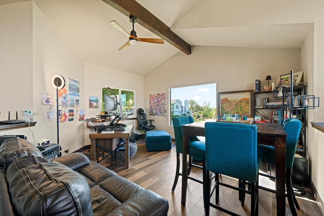 dining room featuring ceiling fan, vaulted ceiling with beams, and hardwood / wood-style floors