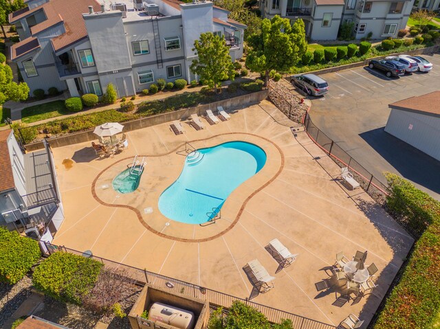 view of swimming pool featuring a patio