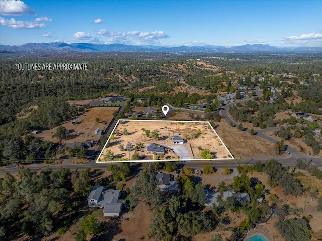 bird's eye view featuring a mountain view