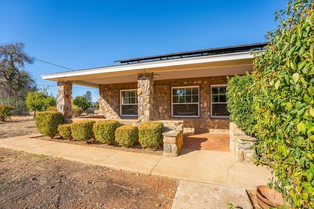 view of front of home featuring covered porch