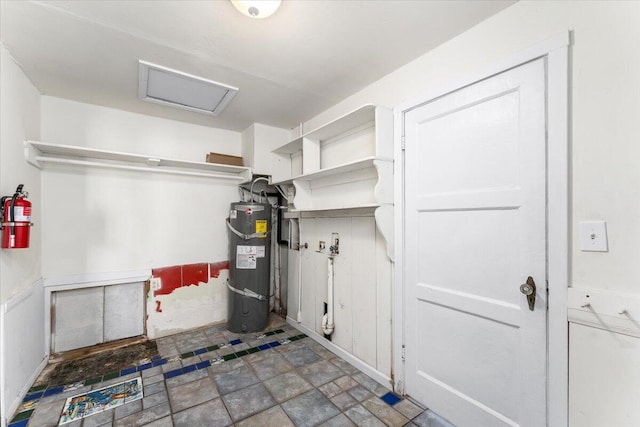 utility room with strapped water heater