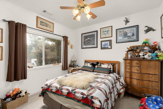 carpeted bedroom featuring ceiling fan