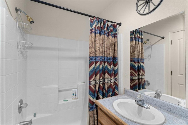 bathroom with shower / bath combo and vanity