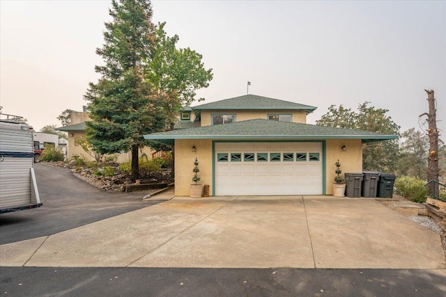 view of front of home with a garage