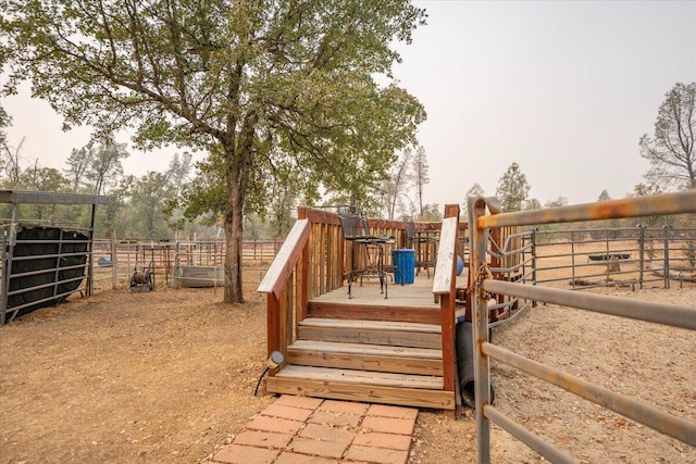 view of yard featuring a wooden deck