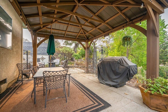 view of patio / terrace with a gazebo and a grill