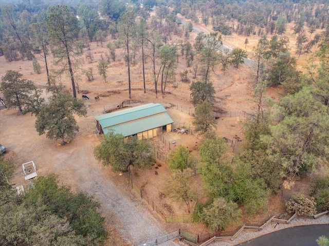 birds eye view of property with a rural view