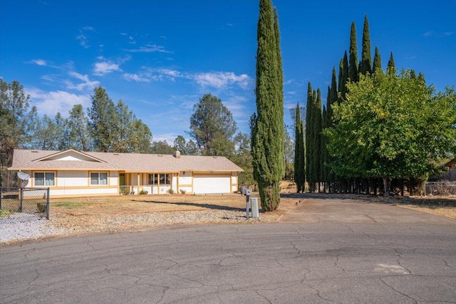 view of front of property featuring a garage