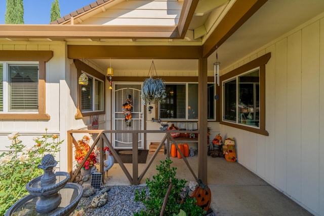 doorway to property with a porch