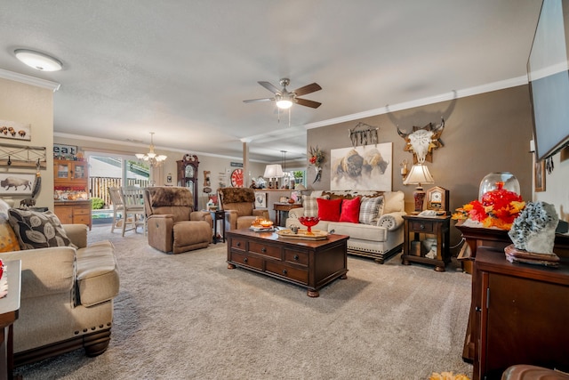 carpeted living room featuring ceiling fan with notable chandelier and crown molding