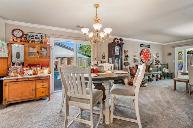 dining room with light colored carpet, crown molding, and a notable chandelier