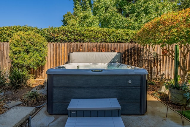 view of patio / terrace featuring a hot tub