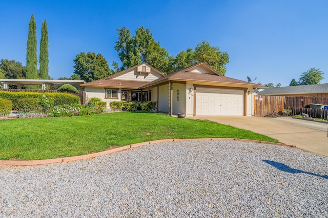 single story home with a garage and a front lawn