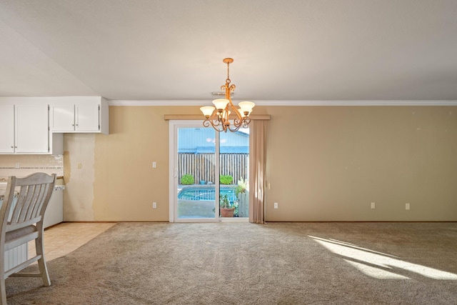 6849 Creekside St, Redding, CA 96001 - unfurnished dining area featuring light colored carpet, a chandelier, crown molding, and baseboards