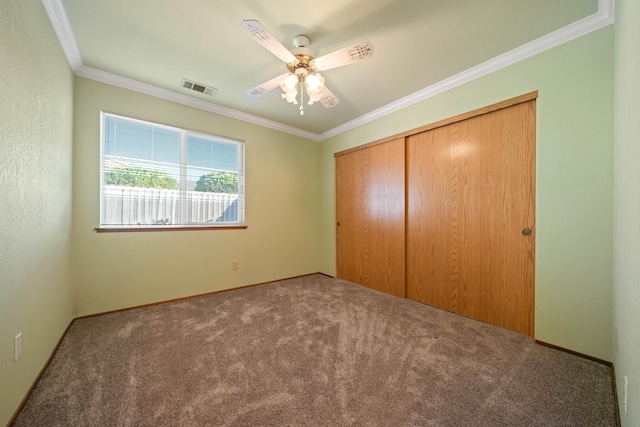 6849 Creekside St, Redding, CA 96001 - unfurnished bedroom featuring carpet floors, ornamental molding, a closet, and a ceiling fan