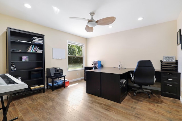 home office with ceiling fan and wood-type flooring