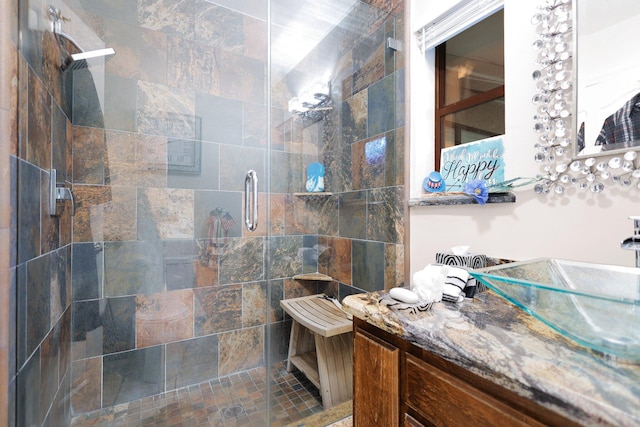 bathroom with vanity and walk in shower