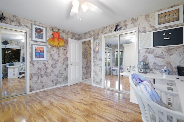 interior space featuring ceiling fan and light hardwood / wood-style flooring