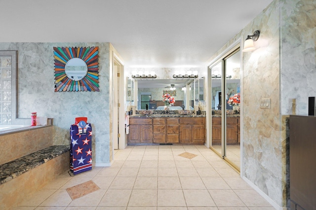 bathroom with vanity and tile patterned floors