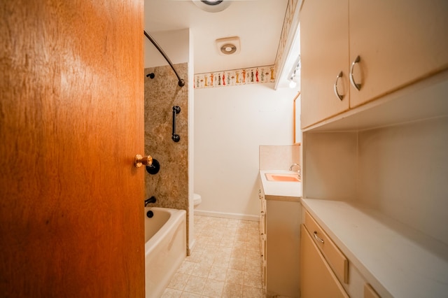 full bathroom featuring vanity, toilet, and tiled shower / bath combo