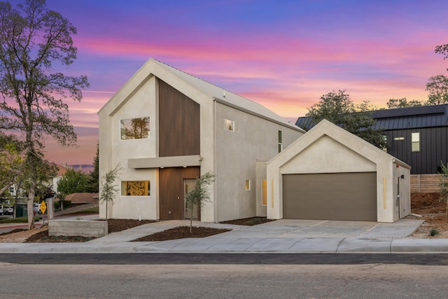 modern home featuring a garage