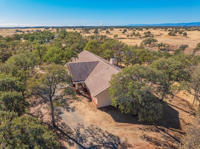 birds eye view of property featuring a rural view