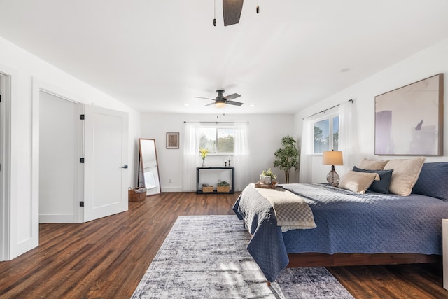 bedroom featuring ceiling fan and dark hardwood / wood-style flooring