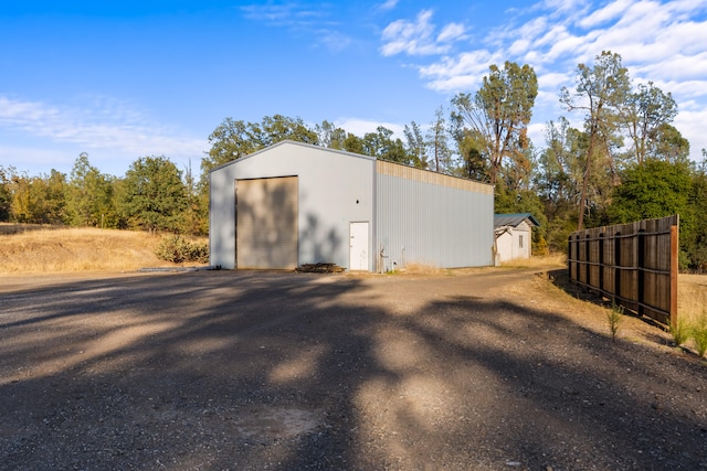 view of outdoor structure featuring a garage