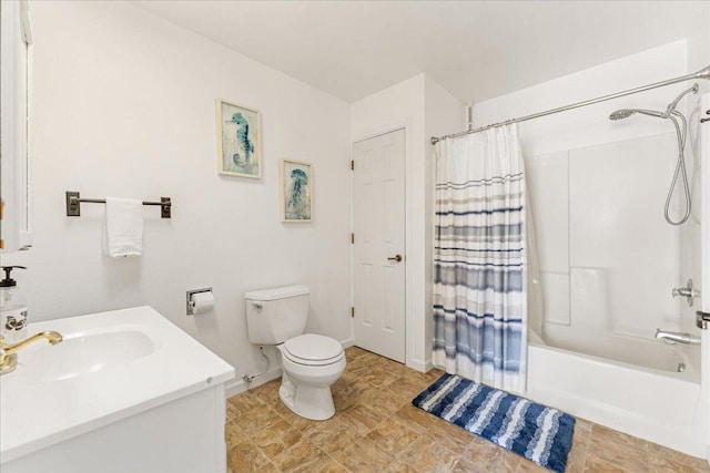 full bathroom featuring vanity, toilet, and shower / bath combination with curtain