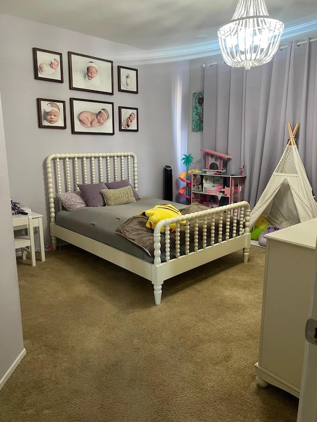 bedroom featuring carpet flooring and an inviting chandelier