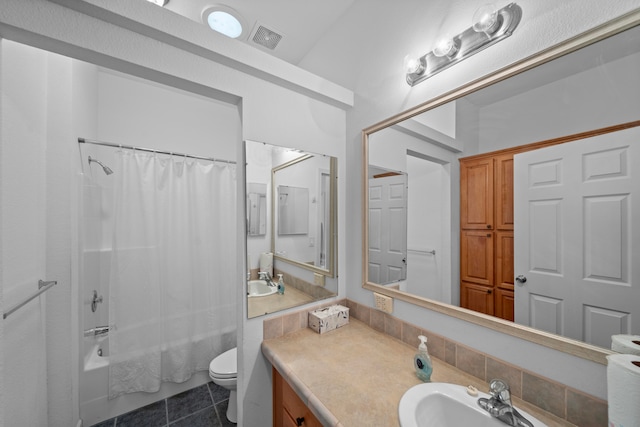 full bathroom with tile patterned floors, vanity, toilet, lofted ceiling, and shower / bath combo with shower curtain