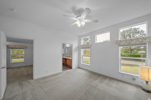 interior space featuring ceiling fan